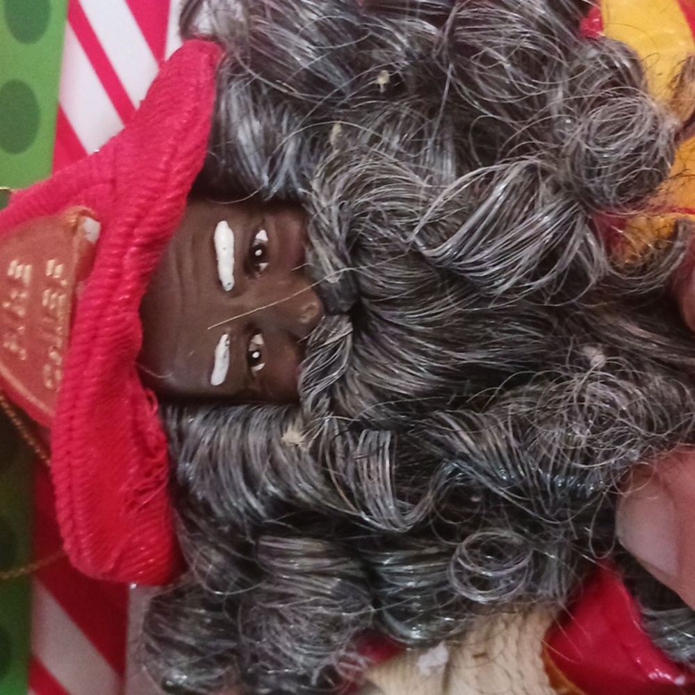 Lord & Taylor 10" Black Fireman w Grey Hair & Holding Hose  Ornament
